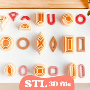 Könnte beinhalten: Eine Sammlung geometrischer Formen in verschiedenen Farben, darunter Rot, Orange und Beige, angeordnet auf einer weißen Oberfläche. Die Formen umfassen Kreise, Rechtecke und Bögen. Der Text "STL 3D file" wird auf rosa Hintergrund angezeigt.