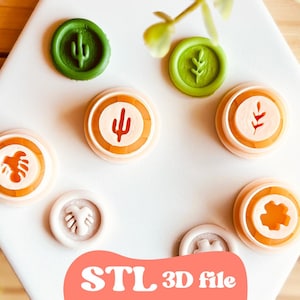 May include: A collection of circular wax seal stamps with various botanical and desert-themed designs, including cacti and leaves. The stamps are in shades of green, orange, and white, arranged on a white geometric surface. The text "STL 3D file" is at the bottom.