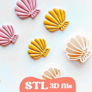 May include: A collection of seashell-shaped 3D models in pink, yellow, and white. The models are arranged on a light blue background. The text "STL 3D file" is displayed in a red oval at the bottom.