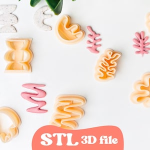 May include: An assortment of 3D printed cookie cutters in various shapes, including abstract forms and coral-like designs. The cutters are in shades of peach and pink, with the text "STL 3D file" in a coral-colored banner.