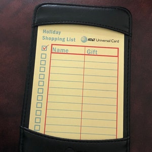 Estuche universal de vinilo negro AT&T con 10 tarjetas, regalo de lista de compras navideñas vintage