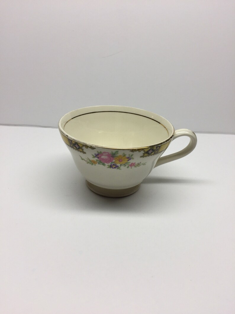 Knowles China Footed tea cup Made in USA 413 Yellow Band With Purple