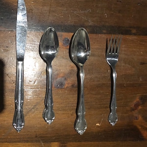 Rogers Custom International Stainless Royal Splendor 3 teaspoons 2 tablespoons 1 salad fork 1 dinner knife.