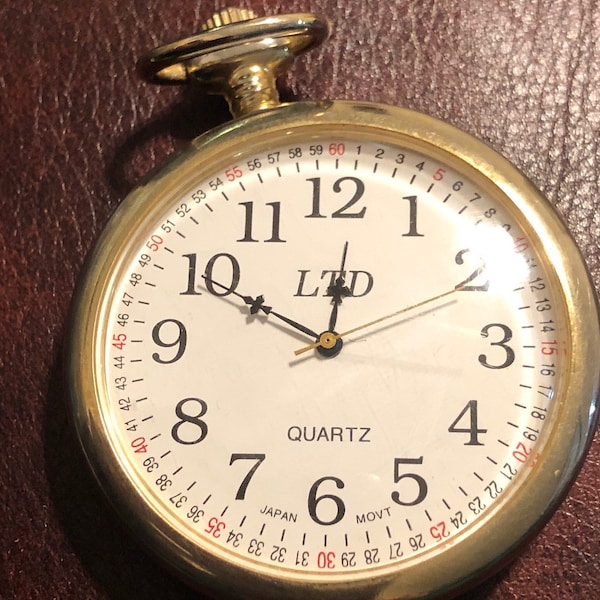 Reloj de bolsillo vintage LTD Advance de cuarzo chapado en oro, movimiento japonés