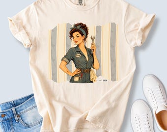 Vintage Female Mechanic Comfort Colors® Tee | Retro Garage Design with Striped Background