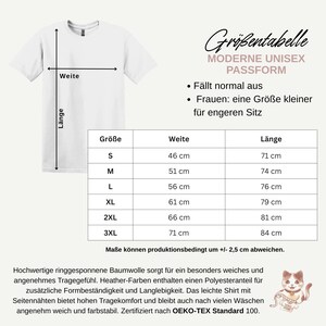 May include: A white t-shirt with a crew neck, displayed with a size chart. The chart provides measurements in centimeters for sizes S to 3XL, including width and length. The text on the chart is in German.