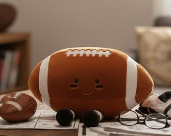 Peluche de fútbol americano kawaii: cojín de pelota de rugby sonriente de 20 cm, bonito adorno deportivo y regalo.