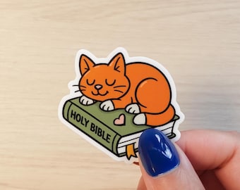 Orange Cat on Bible Waterproof Sticker – Christian Decal