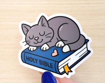 Gray Cat on Bible Sticker 3x3in – Waterproof Vinyl Sticker for Water Bottle, Ipad, Laptop, Scrapbook and Planner