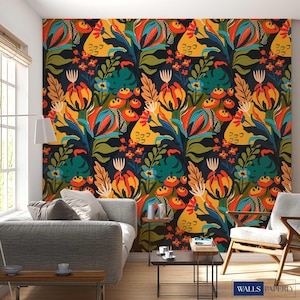 May include: A vibrant floral wallpaper featuring a repeating pattern of stylized flowers and foliage in shades of orange, yellow, blue, and green against a dark background. The design includes large, abstract blooms and leaves, creating a bold and colorful statement.