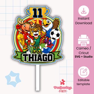May include: A cake topper featuring the number 11, a gold trophy, and cartoon characters including a moose, a leopard, and an eagle with a soccer ball. The design includes the name THIAGO on a green banner, set against a circular background.