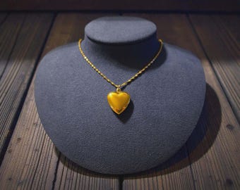 Golden Heart Locket on a Singapore Chain Necklace