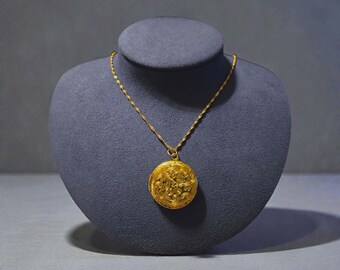 Golden Floral Locket on a Singapore Chain Necklace