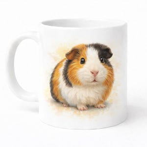 May include: White ceramic mug featuring a watercolor illustration of a guinea pig. The guinea pig has a tri-color coat of brown, black, and white. The mug has a curved handle and a smooth, glossy finish. The background has a light yellow watercolor wash.