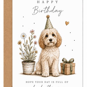 May include: A birthday card with a light brown dog wearing a party hat. The card reads "Happy Birthday" and "Hope your day is full of lovely things". A gift box and potted flowers are also shown on the white card.