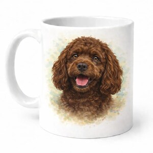 May include: White ceramic mug featuring a watercolor illustration of a brown poodle with a happy expression. The dog has curly fur and a pink tongue. The mug has a white handle and a simple design.