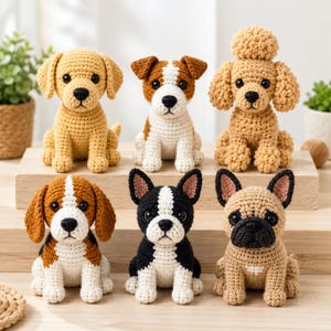 May include: A collection of six crocheted dog figurines in various breeds and colors, including a golden retriever, a terrier, a poodle, a beagle, a Boston terrier, and a French bulldog, all featuring black plastic eyes and stitched noses.