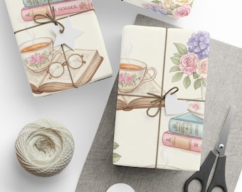 Papel de embrulho com xícaras de chá florais e livros antigos, perfeito para um cantinho de leitura aconchegante.
