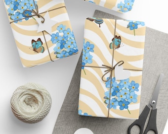 Papel de embrulho "Não Me Esqueças" com borboletas, elegante, floral azul com forro dourado.