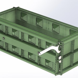 May include: A rectangular olive green industrial mould featuring a reinforced exterior frame with multiple recessed square panels and a silver metal locking lever mechanism attached to the side, designed for structural casting or manufacturing processes.