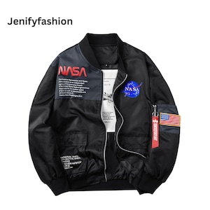 May include: A white ceramic mug with a black handle and the text "But First, Coffee" in a black, bold font. The mug is sitting on a wooden surface. The mug is 4 inches tall.