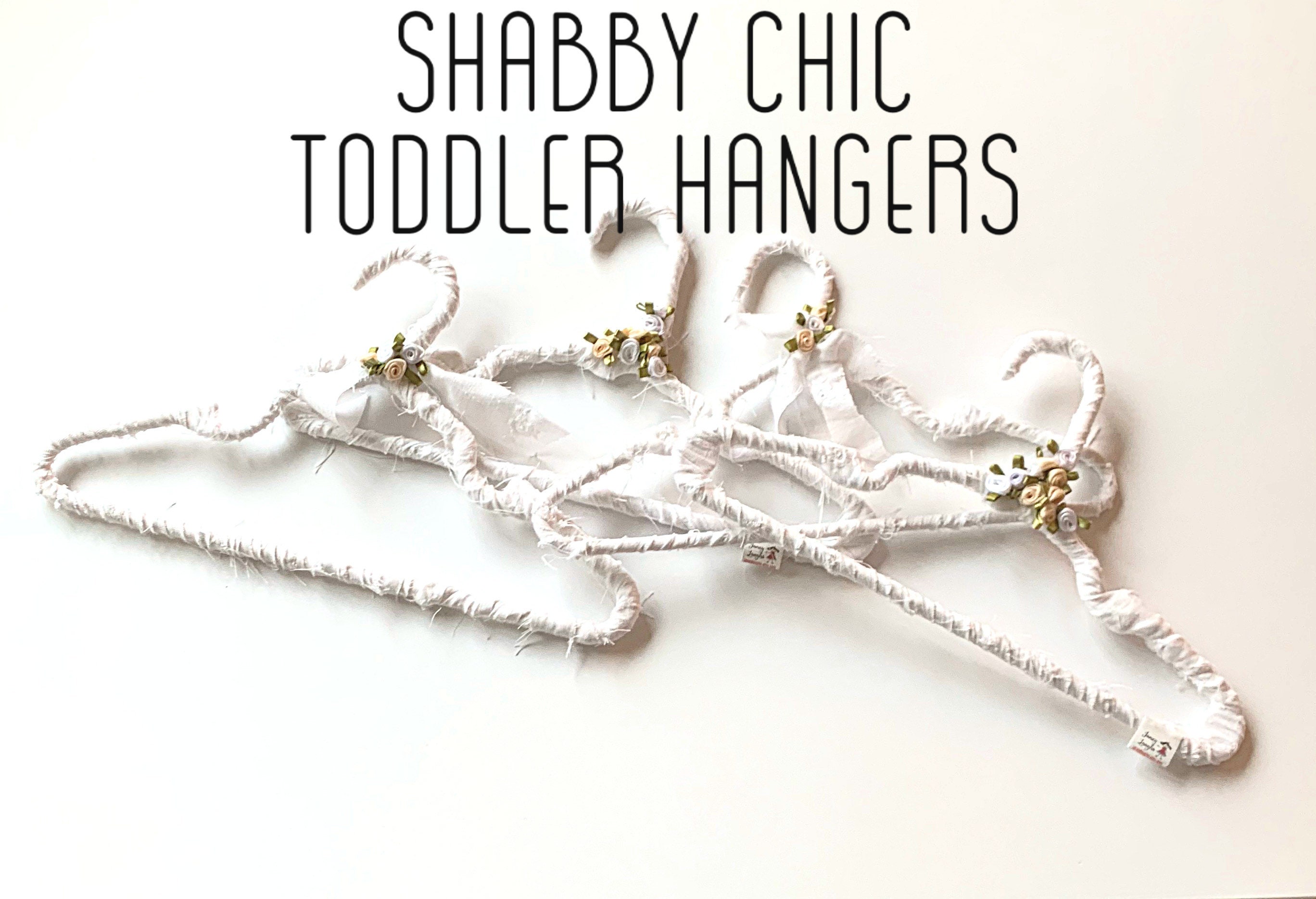 Five Vintage Baby Hangers 