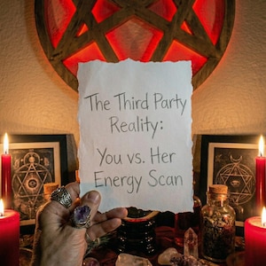 May include: A hand holding a torn piece of paper with the text "The Third Party Reality: You vs. Her Energy Scan." The scene includes lit red candles, crystals, and a wooden pentagram with red lighting.