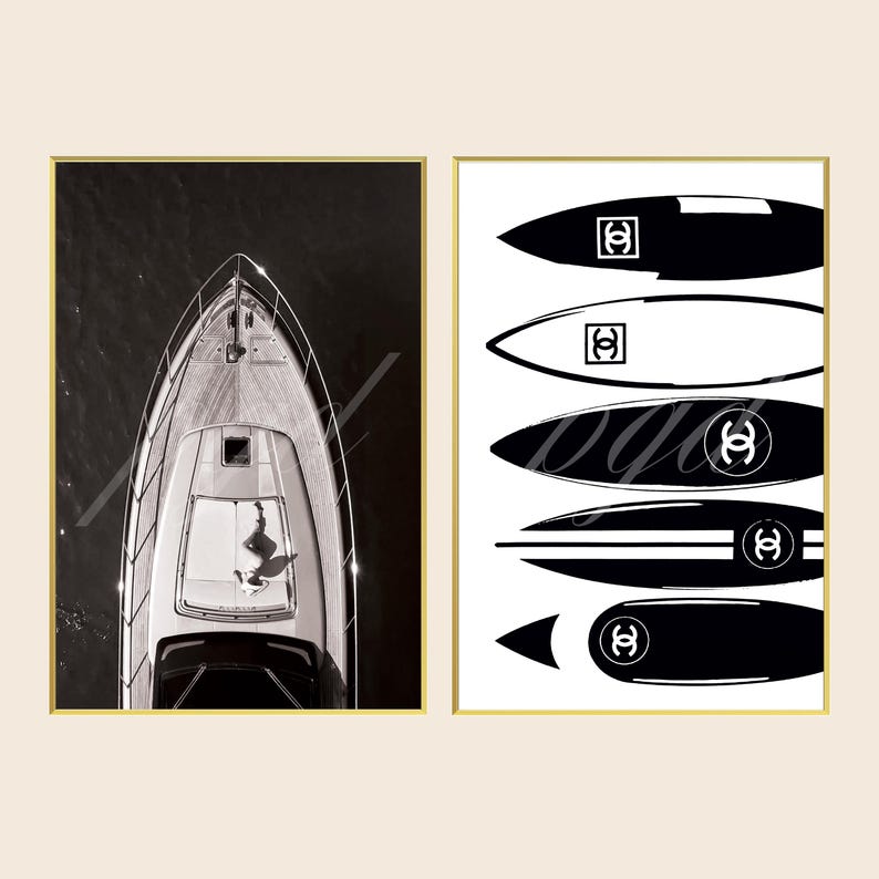 May include: Two framed wall art prints. The left print shows an aerial view of a yacht on dark water. The right print features five stylized surfboard illustrations in black and white, each displaying a double C logo, arranged vertically on a white background.