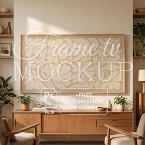 May include: A living room scene featuring a large framed TV mockup with a floral design. The room includes a wooden cabinet, two armchairs, and potted plants. The text "Frame tv MOCKUP" is visible on the TV.