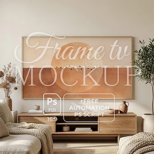 May include: A framed artwork with a warm color palette of orange and brown tones, depicting a stylized sunset with birds in flight. The artwork hangs above a wooden media console, part of a living room setup. The image includes text that says "Frame tv MOCKUP".