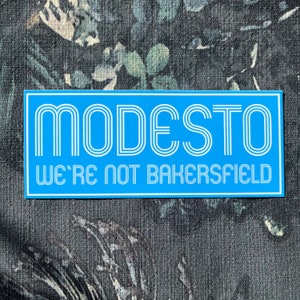 Modesto We’re Not Bakersfield 6&quot; Bumper Sticker