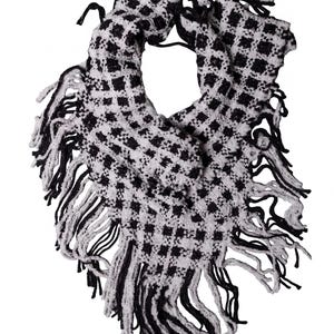 May include: A black and white checkered scarf featuring a textured, woven knit pattern. The scarf is finished with long, loose fringe detailing along the edges, creating a distinct contrast between the dark and light yarn colors throughout.
