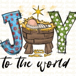 May include: A Christmas-themed design featuring the word "JOY" in a colourful, whimsical font. The letter "O" is replaced with a manger scene, depicting a baby Jesus in a brown wooden crib with a yellow straw bed. The words "to the world" are written in black below the word "JOY".
