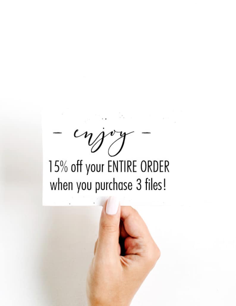 May include: A white card with black text that reads "enjoy" and "15% off your ENTIRE ORDER when you purchase 3 files!" A hand is holding the card.