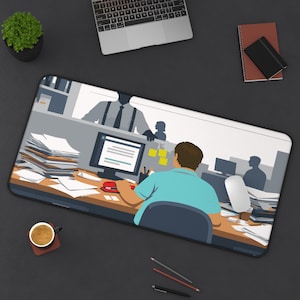 May include: A rectangular desk mat featuring an office scene illustration. The artwork depicts a person at a desk with a computer, surrounded by stacks of paperwork. A coffee cup, pencils, and a mouse are also visible.