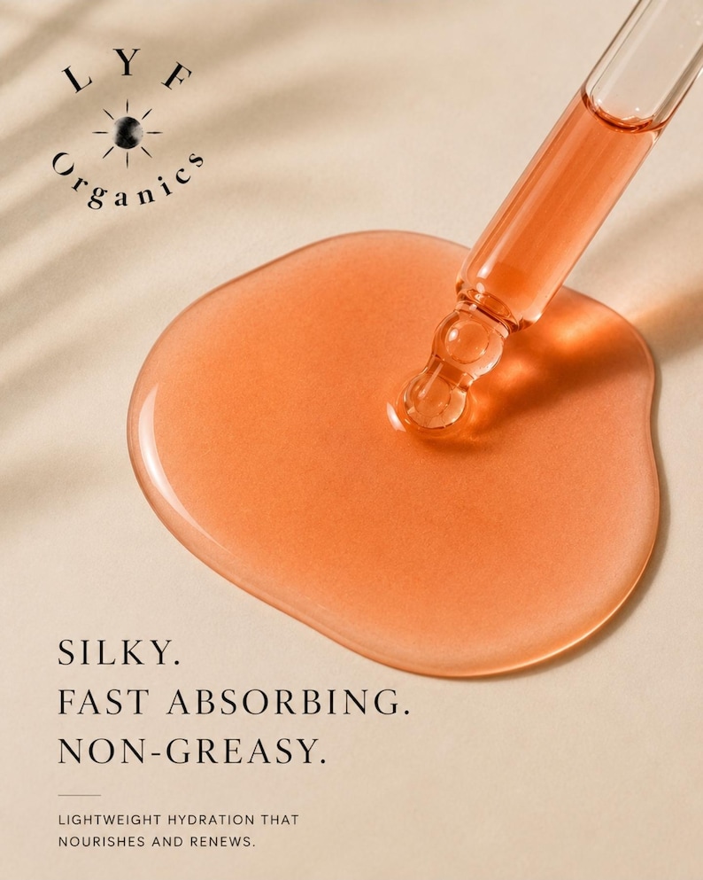 May include: Close-up of a clear glass dropper dispensing a peach-colored liquid onto a light beige surface. The liquid forms a large, glossy puddle. Text reads "Silky. Fast Absorbing. Non-Greasy." and "Lightweight hydration that nourishes and renews."