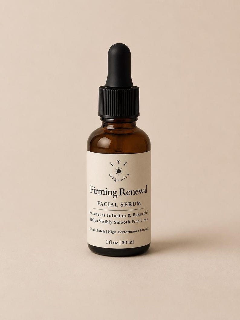 May include: A brown glass bottle of LYF Organics Firming Renewal Facial Serum. The bottle has a black dropper and a white label with product information. The label states the serum contains Paracress Infusion & Bakuchiol and is 1 fl oz / 30 ml.