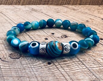 SariBlue® Fordite and Ultra Blue Agate with Light Blue Evil Eye and Pewter Beads Bracelet