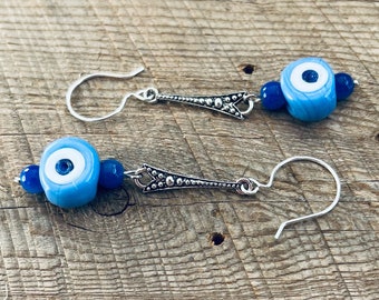 SariBlue Boho Cornflower Blue Evil Eye Dangle Earrings.