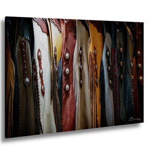 Leather chaps hanging at California trade show with texture and detail