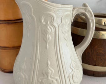 Antique Salt Glazed Drabware Pitcher: Stoneware Pottery with Relief Motifs