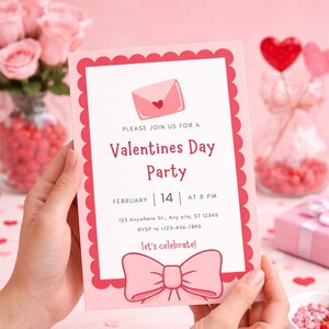 May include: A pink Valentine's Day party invitation with a scalloped border, held by hands. The invitation features an envelope graphic, the text "Valentines Day Party", date, time, and RSVP information, and a bow graphic. Scattered hearts and roses are in the background.
