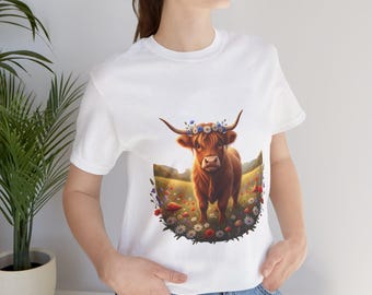 Maglietta con mucca delle Highlands in un prato fiorito / Arte floreale con bovini cornuti