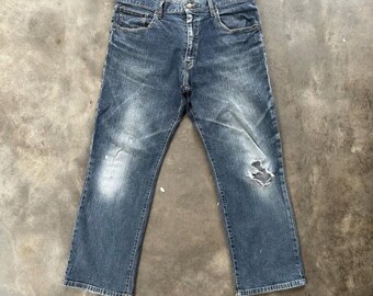 Pantalón vaquero vintage Hanes desgastado de mezclilla cruda, talla 34