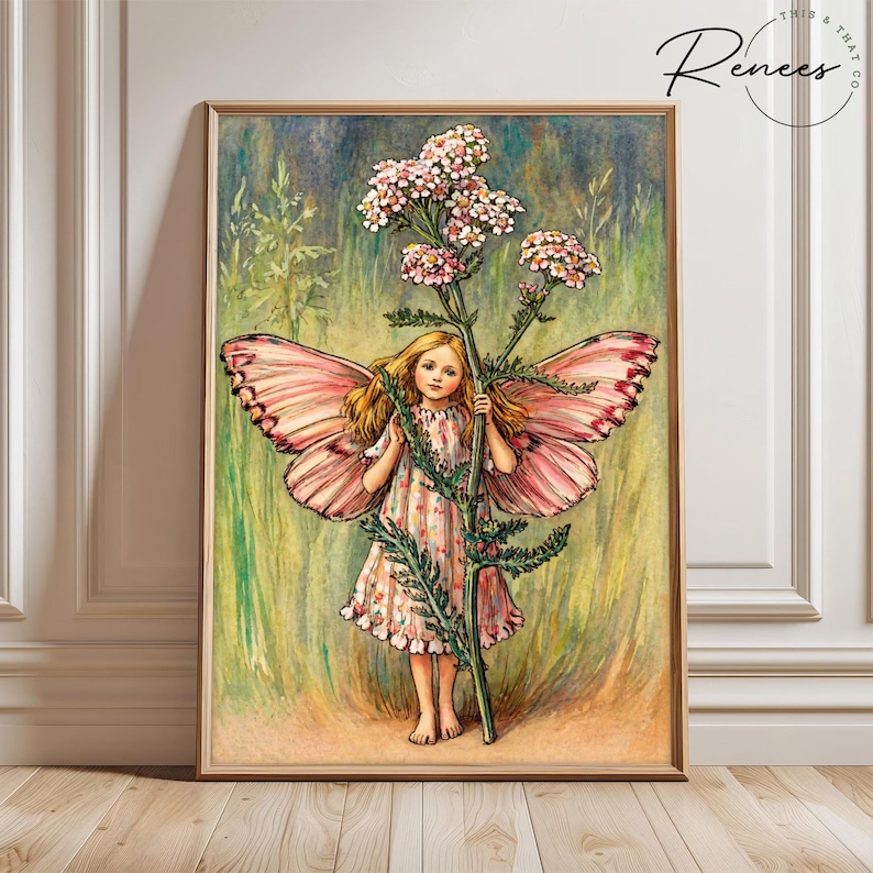 May include: A framed art print featuring a fairy with pink butterfly wings and a floral dress, holding a tall plant with pink flowers. The artwork has a vintage style with a soft color palette of greens, pinks, and yellows.