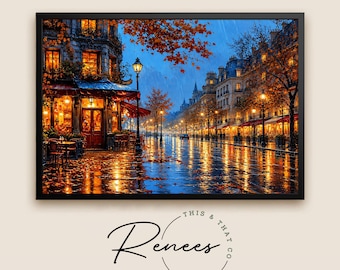 May include: A framed wall art print depicting a rainy Parisian street scene at twilight. The image features a glowing cafe with warm yellow lights, wet cobblestone streets reflecting the illumination, and autumn trees with orange foliage.