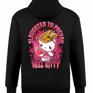 Op de afbeelding: Zwarte hoodie met een afbeelding van Hello Kitty met een schedel-hoofddeksel, een boek vasthoudend, omringd door vlammen en grafstenen. De tekst luidt "SLAUGHTER TO PREVAIL" en "HELL KITTY" in roze en rood.
