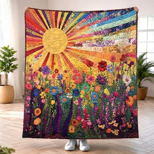 Färgglad quiltad filt med solrosfält, vibrerande blommig ängsfilt, pläd i solsken och natur, bohemisk trädgårdsdekor, mysig presentidé, blommig present