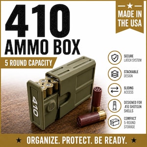 May include: An olive green 410 ammo box with a 5 round capacity. The box features a sliding access mechanism, a secure latch system, and a stackable design. Text on the box reads 410 AMMO BOX, 5 ROUND CAPACITY, MADE IN THE USA, and ORGANIZE. PROTECT. BE READY.