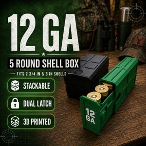 May include: A green 3D printed 12 GA 5 round shell box with a dual latch, holding two brass-cased shotgun shells. The box is labeled 12 GA and fits 2 3/4 inch and 3 inch shells. A black version of the same stackable shell box sits behind it.
